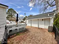 900 Tuscarora Avenue, Elizabeth City, NC 27909 — 2-bedroom home in Pine Grove, Elizabeth City, NC, photo 8 of 26: Garage/ Deck