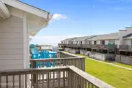 277 Salter Path Road 63, Pine Knoll Shores, NC 28512 — 2-bedroom waterfront townhome in Pine Knoll Townes, Pine Knoll Shores, NC, photo 1 of 31: Pine Knoll Townes 63