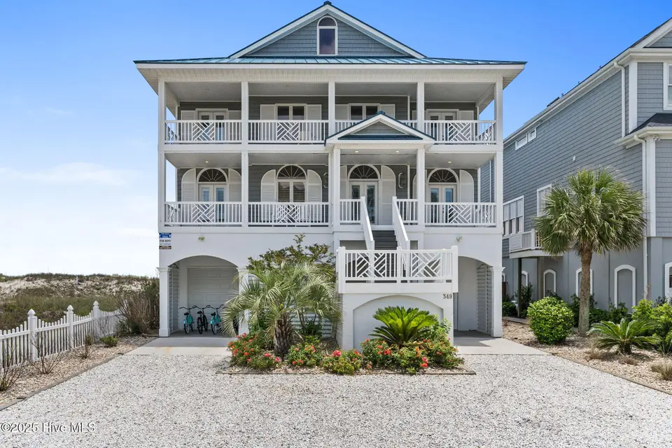 349 W First Street, Ocean Isle Beach, NC 28469 — 6-bedroom waterfront home in Islander Resort, Ocean Isle Beach, NC, photo 1 of 74: 349 W First Street