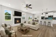 23 Kizzy Drive, Selma, NC 27576 — 3-bedroom home in Howell Farm, Selma, NC, photo 9 of 29: 23 Kizzy Virtually Staged LR