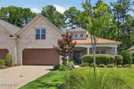 709 Jenoa Drive, Castle Hayne, NC 28429 — 4-bedroom townhome in River Bluffs, Castle Hayne, NC, photo 1 of 54