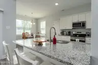 610 Bright Harvest Drive, Maysville, NC 28555 — 3-bedroom home in Batchelors Cove, Maysville, NC, photo 11 of 33: Breakfast Bar in Kitchen