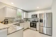 238 NE 35th Street, Oak Island, NC 28465 — 5-bedroom home in Tranquil Harbor, Oak Island, NC, photo 10 of 57