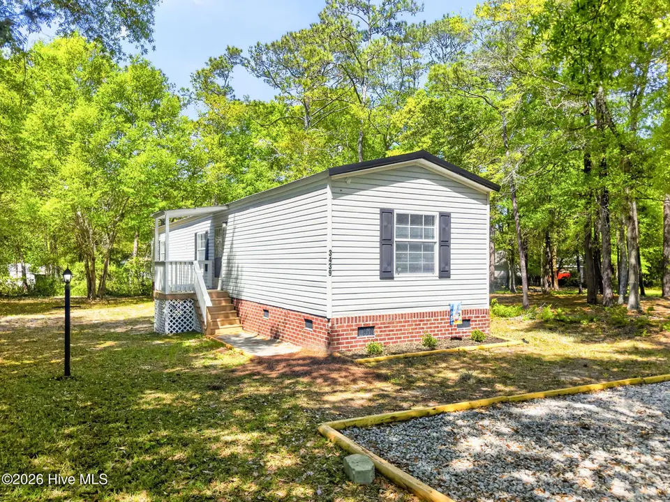 3439 Marlin Drive SE, Bolivia, NC 28422 — 3-bedroom manufactured home in River Run Plantation, Bolivia, NC, photo 1 of 32: Front of house
