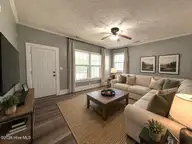 109 E Calhoun Street, Whiteville, NC 28472 — 3-bedroom home, Whiteville, NC, photo 6 of 21: Staged Living Room