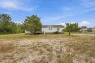 7133 Roebuck Lane NE, Leland, NC 28451 — 3-bedroom manufactured home in Hunters Ridge, Leland, NC, photo 10 of 44: 10_img_0844