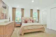 572 Sandy Hollow Drive, Jacksonville, NC 28540 — 3-bedroom townhome in Sandy Hollow, Jacksonville, NC, photo 8 of 19: Primary Bedroom (Similar Home)