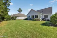 8110 Manassas Lake Lane, Leland, NC 28451 — 3-bedroom home in Brunswick Forest, Leland, NC, photo 2 of 69: Rear Exterior