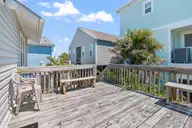 411 5th Street, Sunset Beach, NC 28468 — 4-bedroom home, Sunset Beach, NC, photo 17 of 50: Back Porch leads to ground level