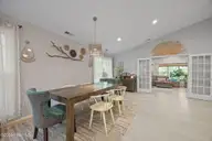 111 Mimosa Boulevard, Pine Knoll Shores, NC 28512 — 3-bedroom waterfront home in Pine Knoll Association, Pine Knoll Shores, NC, photo 13 of 54: Dining Area