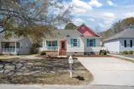 137 NE 4th Street, Oak Island, NC 28465 — 3-bedroom home in Tranquil Harbor, Oak Island, NC, photo 1 of 39: 1-web-or-mls-DSC03138