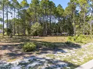 6783 152 Holton Place SW, Ocean Isle Beach, NC 28469 — waterfront lot in Ocean Ridge Plantation, Ocean Isle Beach, NC, photo 1 of 5: Kahunaphoto.com-5