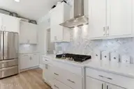 24 W Abaco Way, Hampstead, NC 28443 — 4-bedroom home in Sanctuary at Forest Sound, Hampstead, NC, photo 14 of 63: Kitchen