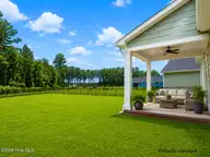1004 Exeter Place, New Bern, NC 28562 — 3-bedroom home in Carolina Colours, New Bern, NC, photo 4 of 39: back