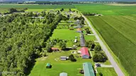 1357 Lambs Grove Road, Elizabeth City, NC 27909 — 3-bedroom home, Elizabeth City, NC, photo 4 of 29: 005_DJI_20260710082415_0865_D