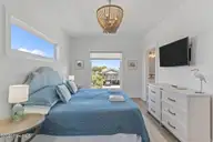 2205 E Beach Drive, Oak Island, NC 28465 — 6-bedroom waterfront home in Long Beach, Oak Island, NC, photo 17 of 55