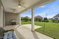 3095 Crescent Lake Drive, Calabash, NC 28467 — 3-bedroom home in Calabash Lakes, Calabash, NC, photo 8 of 74: Back Patio