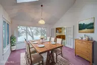 112 Coastal Bluffs Court, Hampstead, NC 28443 — 4-bedroom waterfront home in Olde Point, Hampstead, NC, photo 15 of 37: Dining room Pre-carpet change