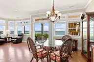 8632 Sound Drive A1, Emerald Isle, NC 28594 — 2-bedroom waterfront condo in Sunset Harbor, Emerald Isle, NC, photo 6 of 52: Open Kitchen, Dining and Living