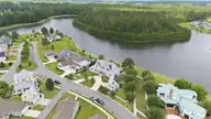 4030 Reunion Pointe Lane, New Bern, NC 28562 — 4-bedroom waterfront home in Carolina Colours, New Bern, NC, photo 13 of 73: 14-web-or-mls-DJI_20260617115933_0715_D