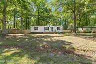 9659 Holly Hills Drive NE, Leland, NC 28451 — 3-bedroom manufactured home in Holly Hills, Leland, NC, photo 1 of 34: 1_img_3114