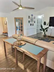117 Halls Creek Drive, Swansboro, NC 28584 — 4-bedroom waterfront home in Halls Creek At The Hammocks, Swansboro, NC, photo 14 of 38: living room 3