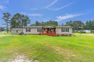 414 Sherrow River Drive SW, Shallotte, NC 28470 — 3-bedroom waterfront manufactured home in Sherrow River Estate, Shallotte, NC, photo 1 of 38: 1_414 sherrow river dr-00001
