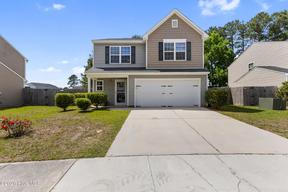 1042 Lake Norman Lane, Leland, NC 28451 — 3-bedroom home in Lake Forest Village, Leland, NC, photo 1 of 29