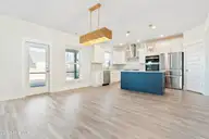 1368 Trisail Terrace, Wilmington, NC 28412 — 3-bedroom home in Riverlights, Wilmington, NC, photo 16 of 68: 1368 Trisail dining and kit 2