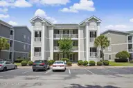 866 Great Egret Circle SW # 3, Sunset Beach, NC 28468 — 2-bedroom waterfront condo in Sandpiper Bay, Sunset Beach, NC, photo 1 of 39
