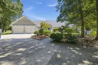 711 N Green Tee Road, Hampstead, NC 28443 — 4-bedroom waterfront home in Olde Point, Hampstead, NC, photo 1 of 21