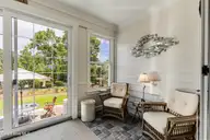 497 Broomsedge Court SE, Bolivia, NC 28422 — 4-bedroom waterfront home in Winding River Plantation, Bolivia, NC, photo 16 of 60: Sunroom 3