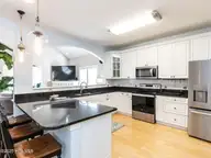 129 Sunset Drive, Cedar Point, NC 28584 — 3-bedroom waterfront home in Plantation Shores, Cedar Point, NC, photo 11 of 46: 011-1280x960-kitchen
