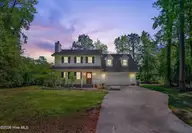 411 Candlewood Drive, Jacksonville, NC 28540 — 4-bedroom home in Riverwood Estates, Jacksonville, NC, photo 10 of 77: Twilight (1 of 1) (1)