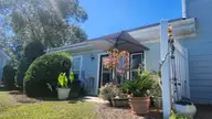 125 Willow Pond Drive, Morehead City, NC 28557 — 2-bedroom townhome in The Landings, Morehead City, NC, photo 4 of 5: Willow Rear1