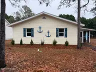 114 NW 14th Street, Oak Island, NC 28465 — 3-bedroom home, Oak Island, NC, photo 1 of 48: IMG_0723