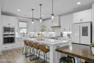 524 Moss Lake Lane, Holly Ridge, NC 28445 — 5-bedroom waterfront home in Summerhouse On Everett Bay, Holly Ridge, NC, photo 10 of 71: 44_kitchen