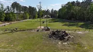 104 Bridle Path Lane, Carthage, NC 28327 — 3-bedroom waterfront home in Carolina Equest, Carthage, NC, photo 21 of 64: DJI_20250418164430_0089_D