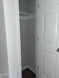 84 Crush Court, Swansboro, NC 28584 — 3-bedroom townhome in Pirates Cove Townhouses, Swansboro, NC, photo 16 of 29: Linen Closet Interior