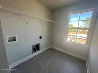 3002 Old Berwick Street SW, Shallotte, NC 28470 — 5-bedroom home in Rutledge, Shallotte, NC, photo 7 of 45: Laundry Room