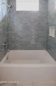 12 Eastman Place, Pinehurst, NC 28374 — 5-bedroom home in Forest Creek, Pinehurst, NC, photo 20 of 32: Guest Bath
