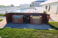 Ocean Sands, Atlantic Beach — 1-bedroom waterfront condo in Ocean Sands, Atlantic Beach, NC, photo 24 of 40: EXT BBQ PITS