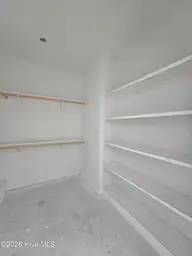 203 Gaston Drive, Elizabeth City, NC 27909 — 3-bedroom waterfront home in Newbegun Land, Elizabeth City, NC, photo 12 of 18: Primary BR Closet