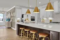 468 Heart Pne Avenue Lot 32, Wilmington, NC 28411 — 4-bedroom home in Indigo at Abbey Preserve, Wilmington, NC, photo 6 of 15: Kitchen - NOT SUBJECT HOME SIMILAR PHOTO