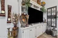 214 Weeping Willow Drive, La Grange, NC 28551 — 3-bedroom home in Willow Pond, La Grange, NC, photo 15 of 31: Beautiful TV cabinet