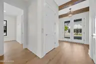 1826 Montage Lane, Wilmington, NC 28403 — 4-bedroom home in Airlie at Wrightsville Sound, Wilmington, NC, photo 7 of 76: 13_hallway