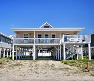 461 E Third Street, Ocean Isle Beach, NC 28469 — 4-bedroom waterfront home, Ocean Isle Beach, NC, photo 9 of 57: Exterior