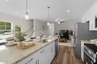 236 Cline Way Unit 127, Beaufort, NC 28516 — 3-bedroom townhome in 1809 Live Oak, Beaufort, NC, photo 11 of 37: Kitchen Open to Living Room