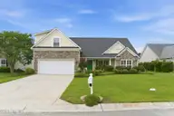 206 Heartwood Drive, Hampstead, NC 28443 — 3-bedroom home in Hampstead Pines, Hampstead, NC, photo 1 of 54