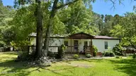 648 Old Church Road, Swansboro, NC 28584 — 3-bedroom manufactured home in Cedar Creek Est, Swansboro, NC, photo 2 of 37: front